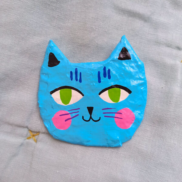 Gata azul . Pins